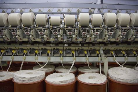 two machines in a factory are used to make yarn